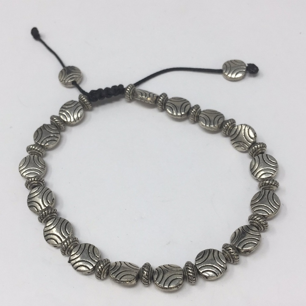 Adjustable bracelet silver tone beads and cording